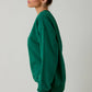 CREW NECK LONG SLEEVE "THE HOME BY 8PM CLUB" SWEATSHIRT