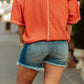 Mid Rise Medium Wash Raw Hem Shorts