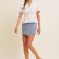 BUTTON-DOWN COTTON EYELET BLOUSE WITH SMOCKED BACK