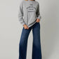 CREW NECK LONG SLEEVE "THE HOME BY 8PM CLUB" SWEATSHIRT
