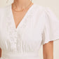 BUTTON-DOWN COTTON EYELET BLOUSE WITH SMOCKED BACK