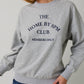 CREW NECK LONG SLEEVE "THE HOME BY 8PM CLUB" SWEATSHIRT