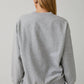 CREW NECK LONG SLEEVE "THE HOME BY 8PM CLUB" SWEATSHIRT