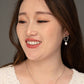 Everlasting Pearl Earrings in White Gold