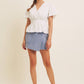BUTTON-DOWN COTTON EYELET BLOUSE WITH SMOCKED BACK
