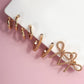 TRIO HUGGIE BOW HOOP EARRINGS